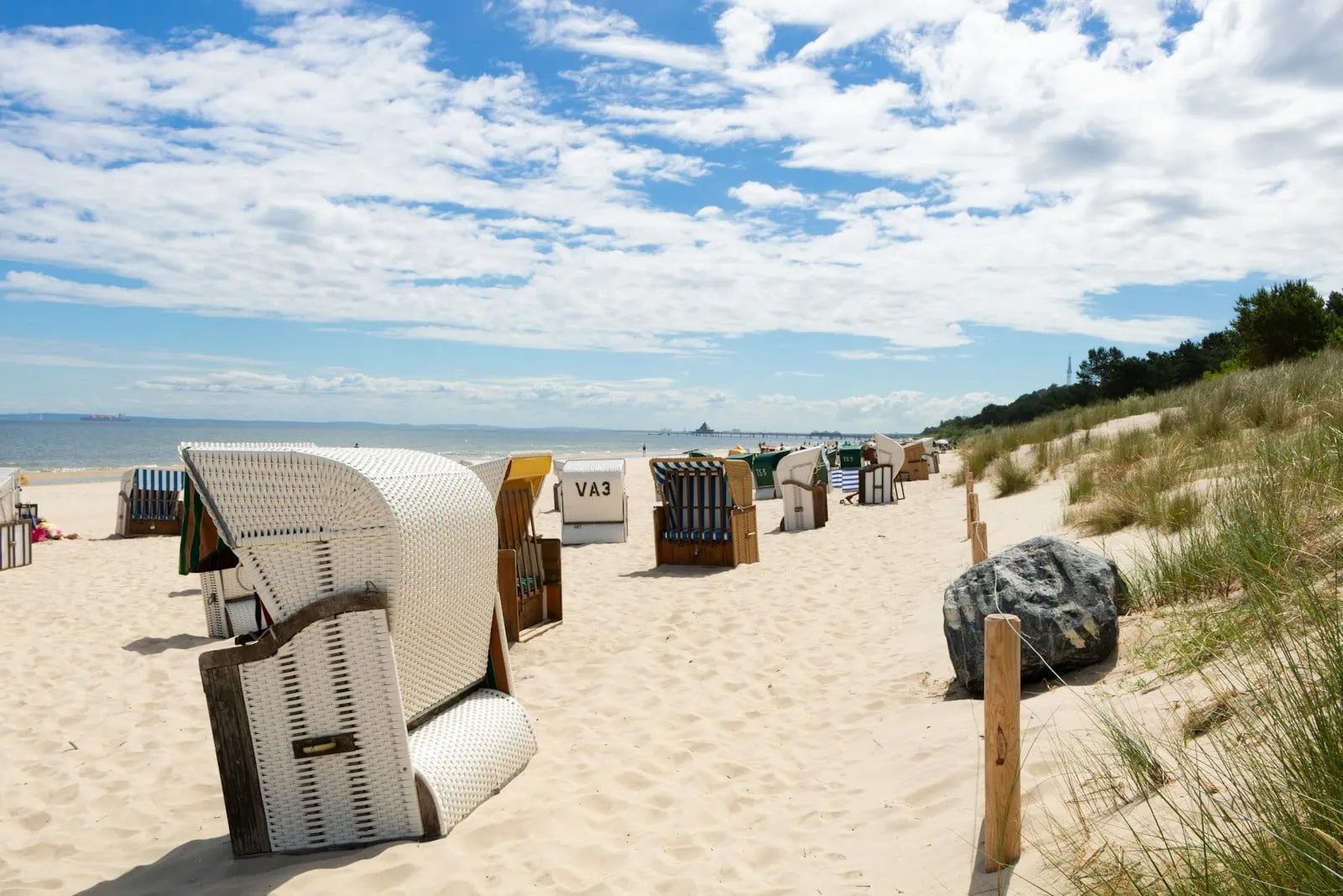 white and gray bench on seashore